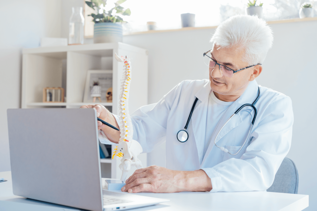 A doctor showing an issue during an online consultation